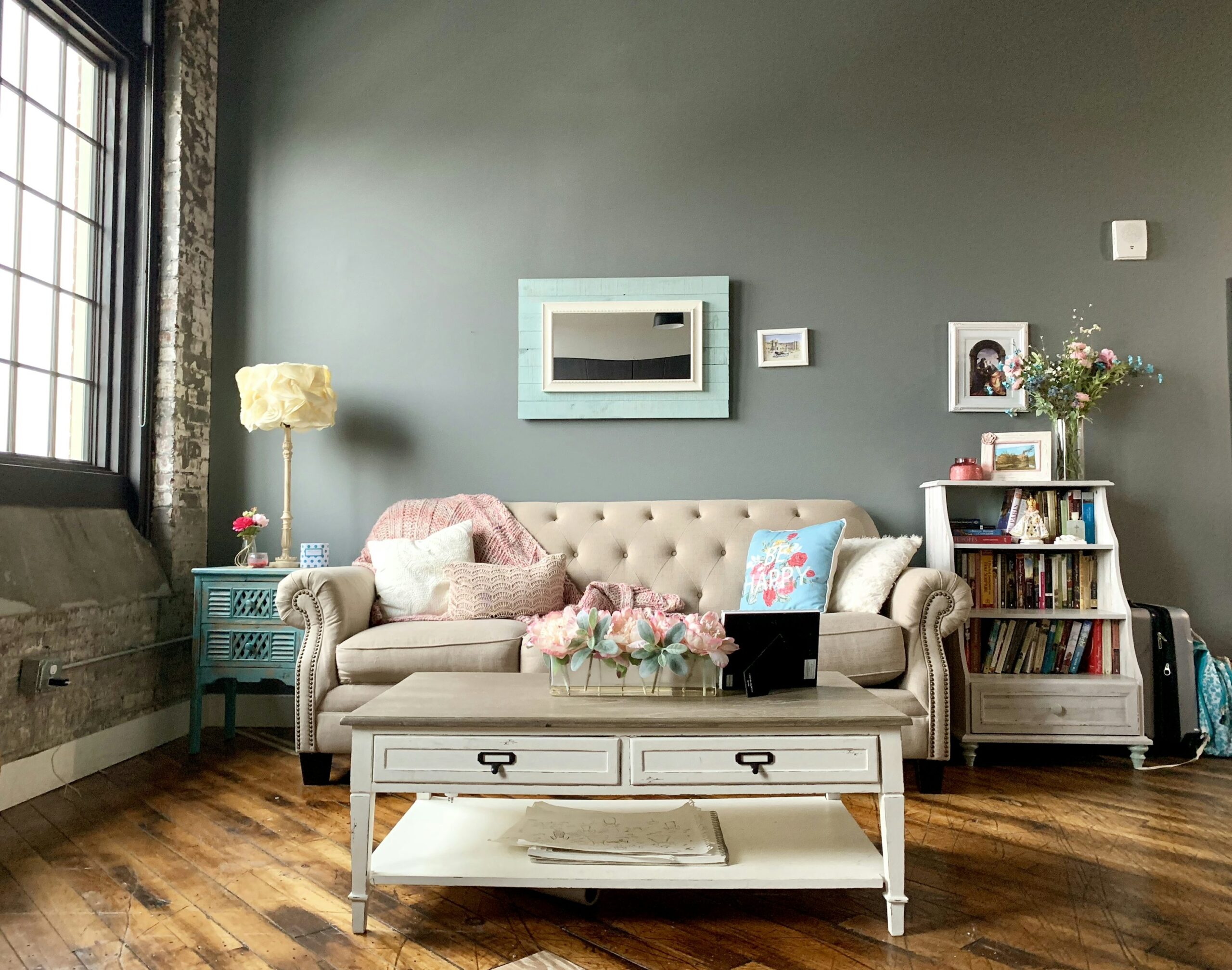 photo 1581467695675 7e3753e5ab26 - Magvilla white wooden 2 layer drawer beside white couch